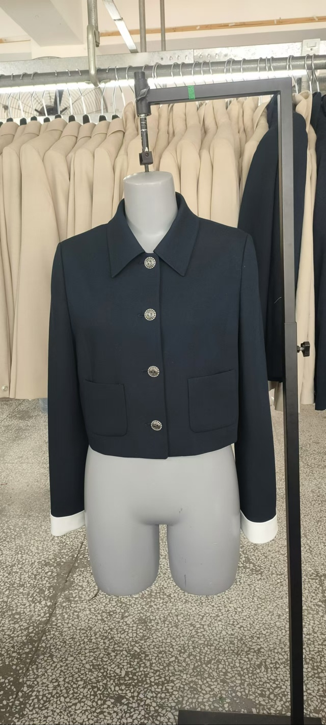 Black tailored jacket on form